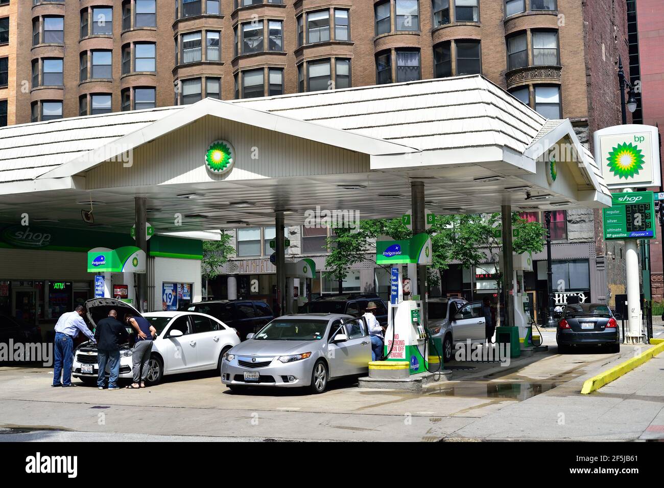 Chicago, Illinois, USA. A rare gas/service station in downtown Chicago. Stock Photo