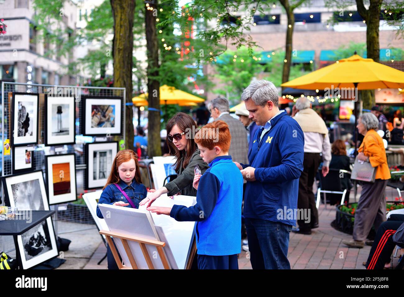 Chicago, Illinois, USA. Artist display their work on Rush Street in