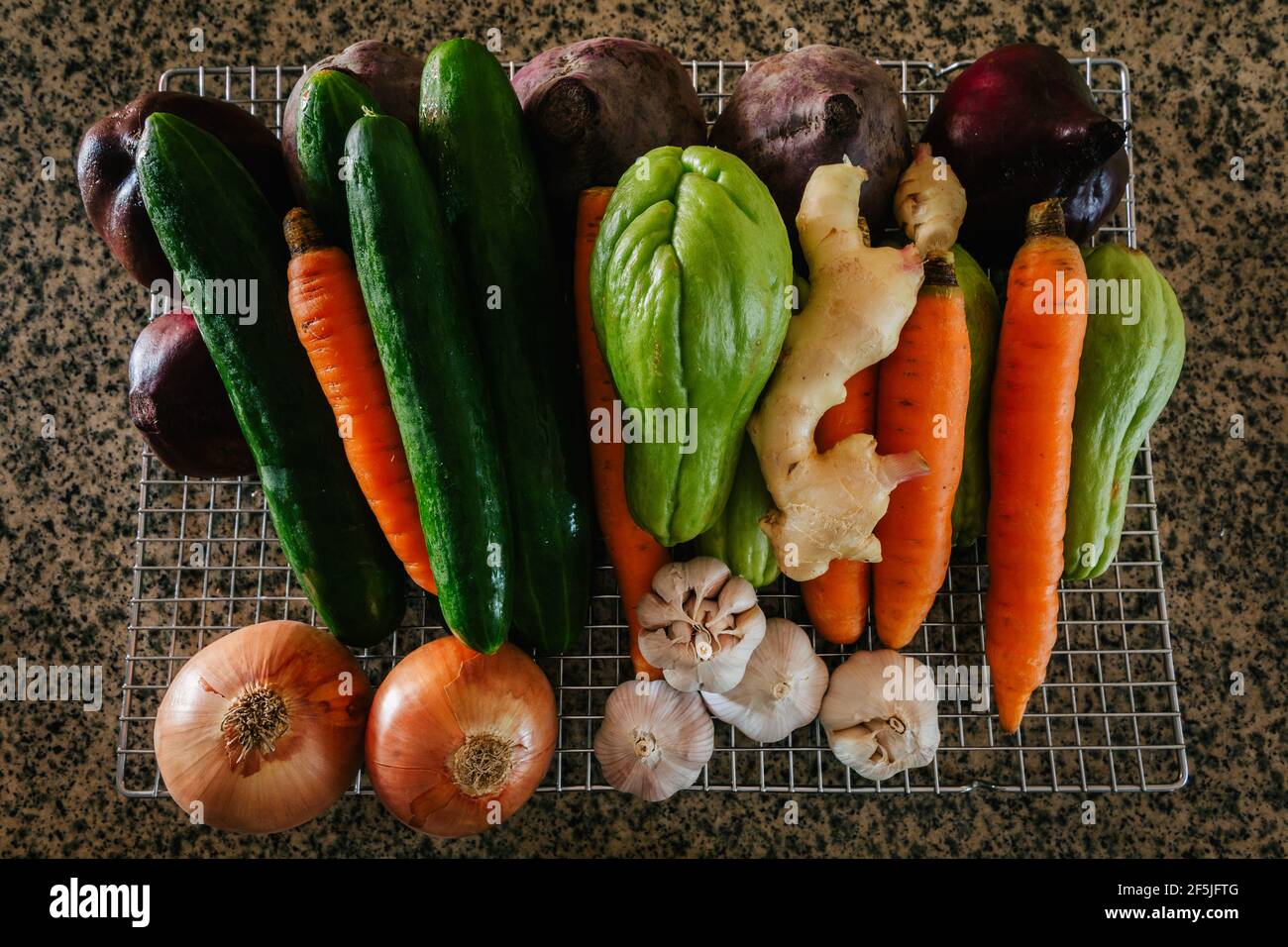 Mixture of raw vegetables on granite table top Stock Photo Alamy