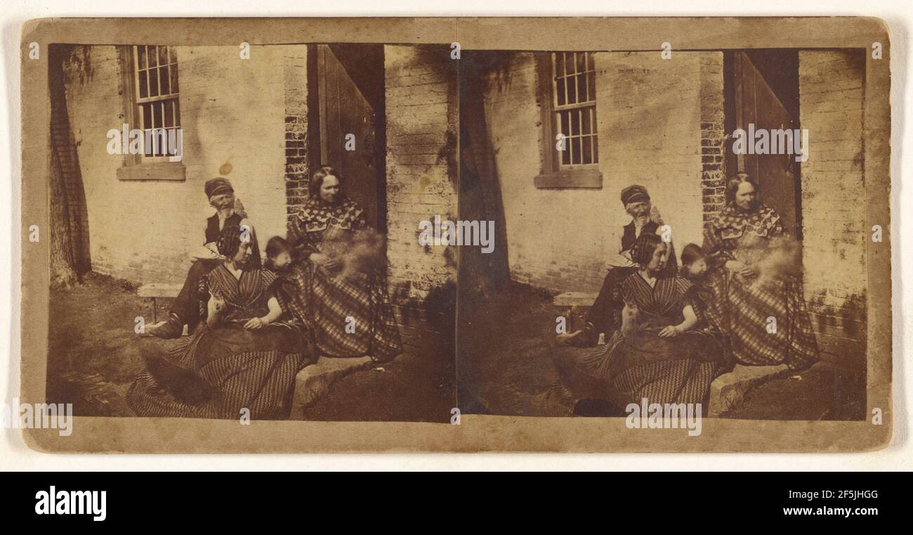 Family posed at entrance to house. Unknown maker, American Stock Photo ...