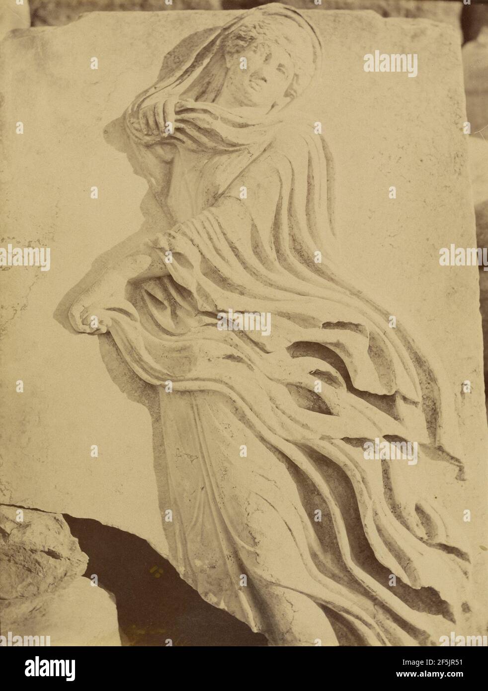 Sculptural fragment - dancing Maenad in high relief. Dimitrios Constantin (Greek, active 1858 - 1860s) Stock Photo