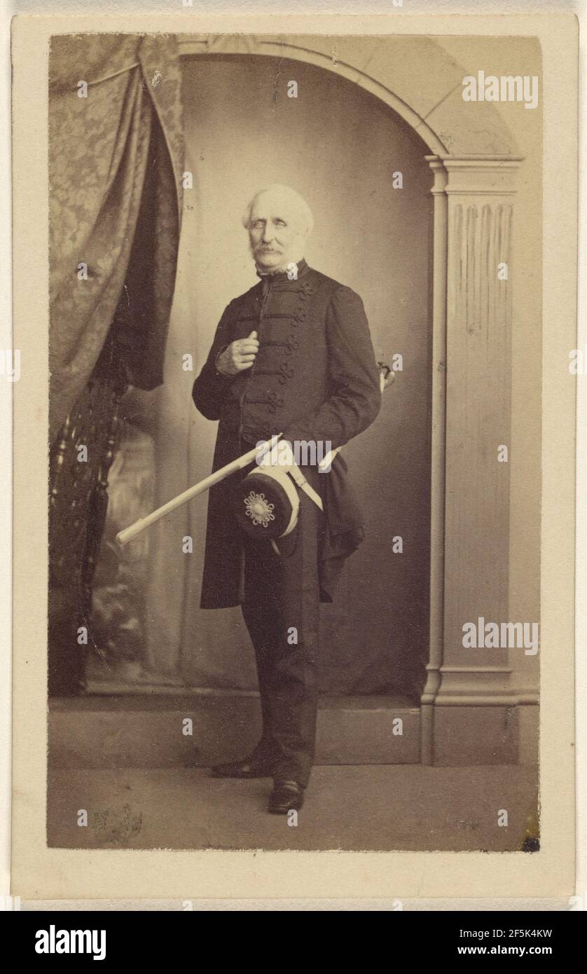 Unidentified man wearing a dress uniform, standing, holding a hat with his sword under his arm. Thomas Rodger (Scottish, 1832 - 1883) Stock Photo