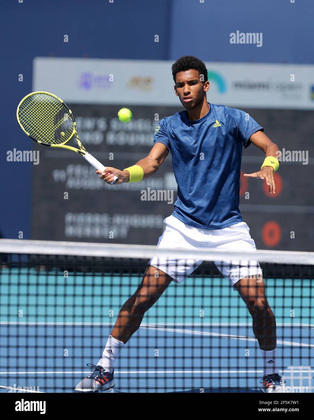 MIAMI GARDENS, FLORIDA - MARCH 26: Felix Auger-Aliassime practices prior to  his match on Day 5 of the 2021 Miami Open on March 26, 2021 in Miami  Gardens, Florida People: Felix Auger-Aliassime