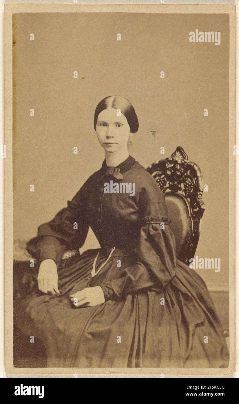 Unidentified woman seated hi-res stock photography and images - Alamy