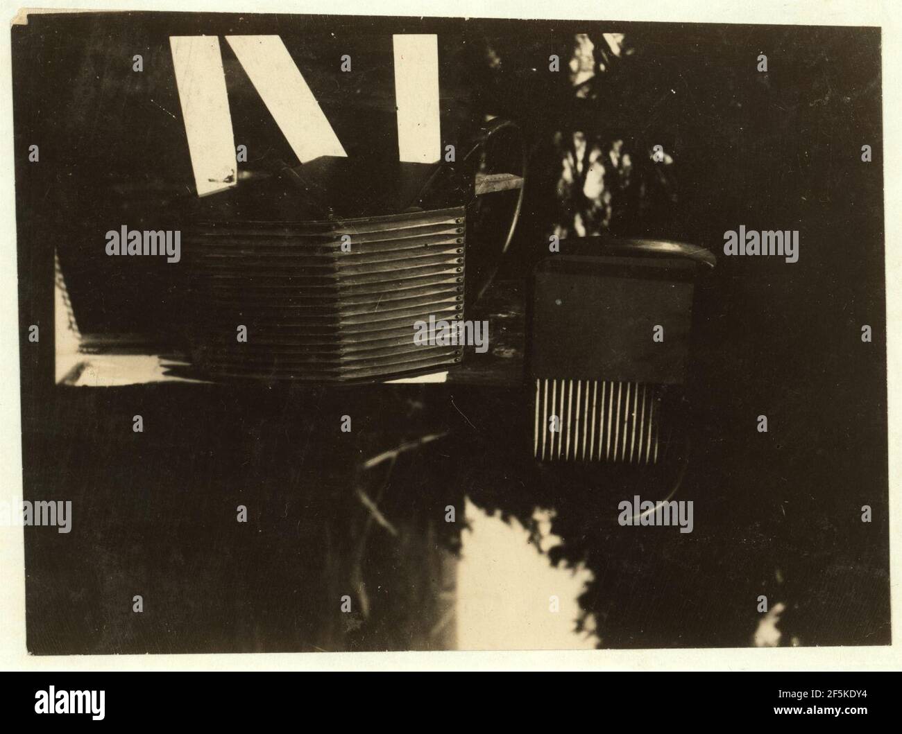 Rake used by Wisconsin cranberry growers. Notice two handles and their ...