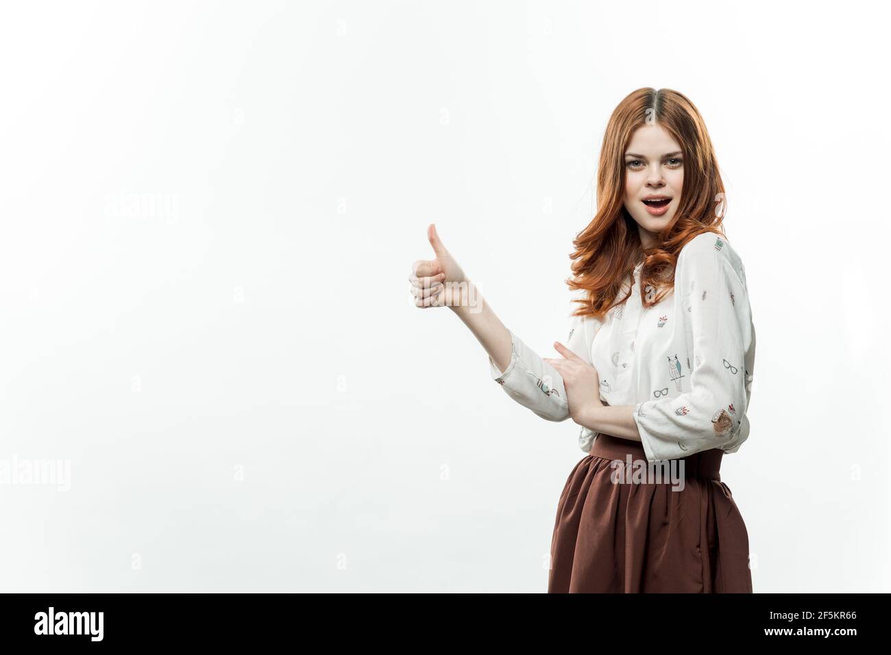 cheerful elegant woman gesturing with hand formal suit Stock Photo - Alamy