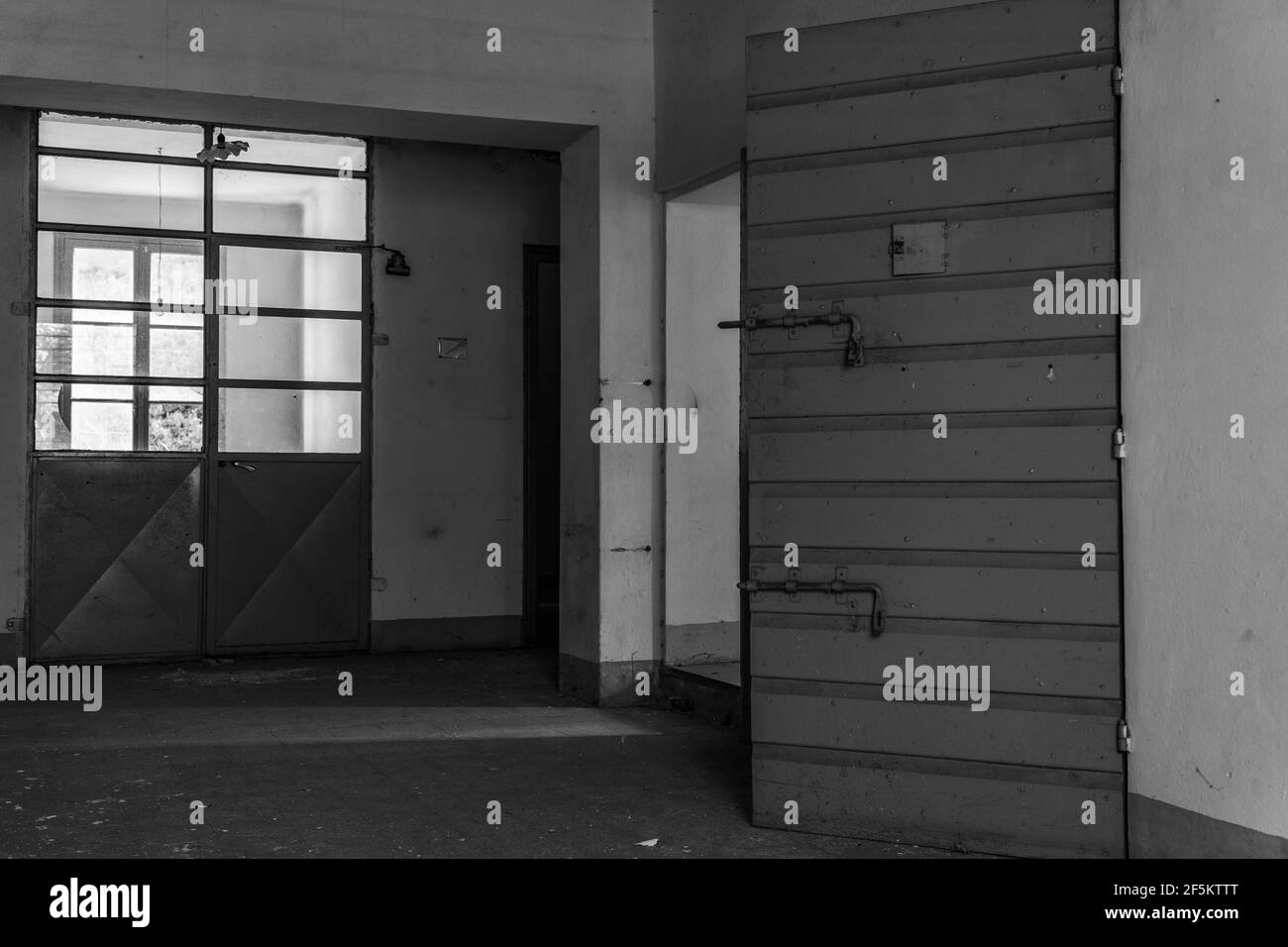 Old abandoned building with prison cell  inside Stock Photo