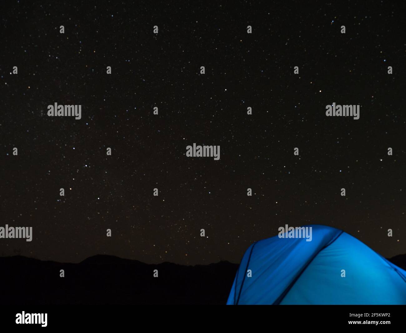 Star photography over tent at Ibex dunes, Death Valley National Park, California, USA Stock Photo