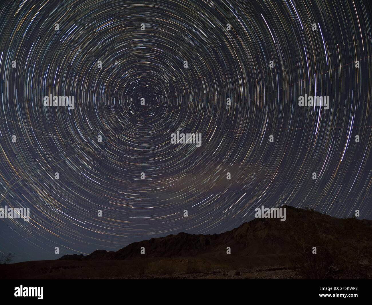 Star photography over mountains at Death Valley National Park, California, USA Stock Photo