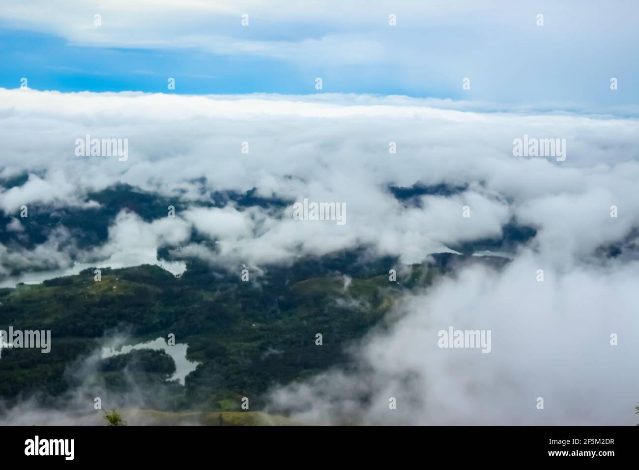 Beautiful Ariel View Of Misty Clouds Passing Over The Mountains