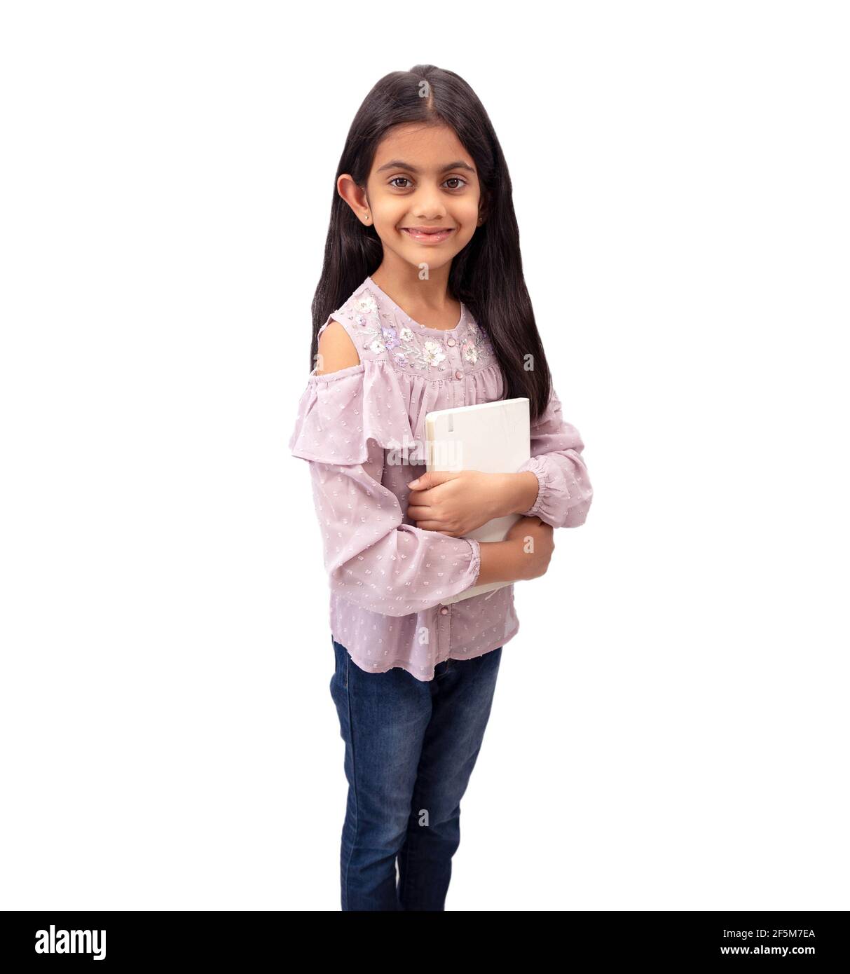 PORTRAIT OF A CUTE SMILING INDIAN SCHOOL GIRL HOLDING A BOOK. Home ...