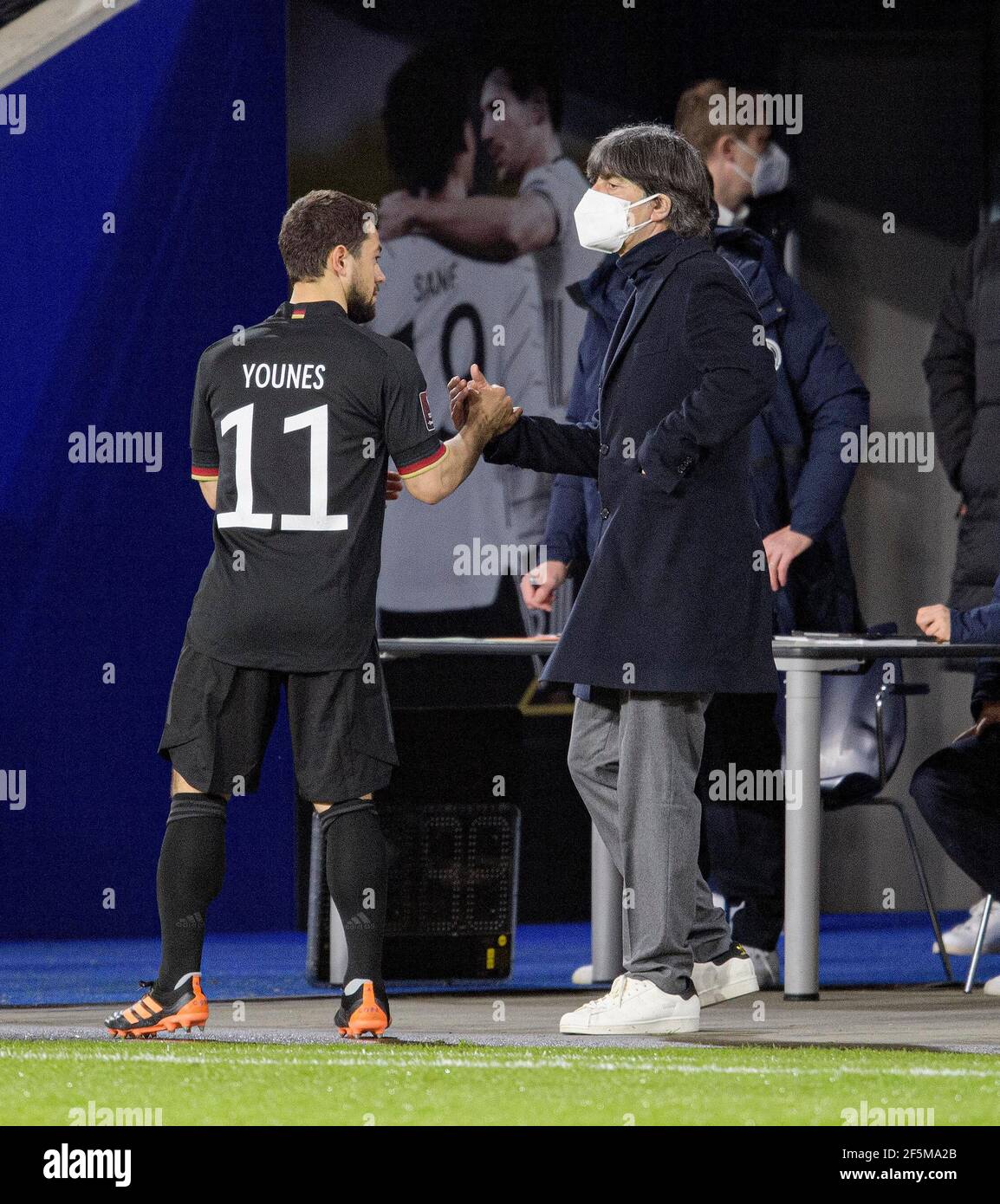 Duisburg, Deutschland. 25th Mar, 2021. Substitution (in) Amin YOUNES l. (GER), coach/federal coach Joachim 'Jogi' LOEW (Loew, GER) claps, Soccer Laenderspiel, World Cup Qualification Group J matchday 1, Germany (GER) - Iceland (ISL), on 03/25/2021 in Duisburg/Germany . Â | usage worldwide Credit: dpa/Alamy Live News Stock Photo