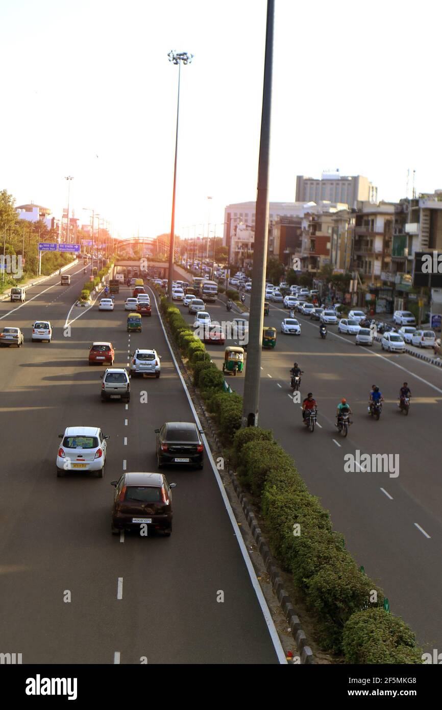 Traffic in Delhi city during sunset time Stock Photo