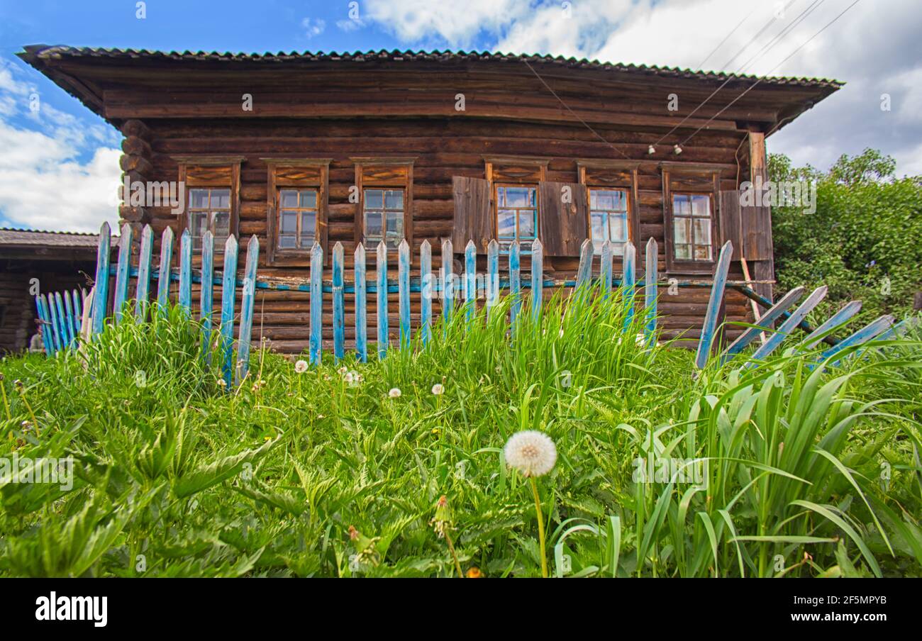 old wooden log house on the hill in summer Stock Photo - Alamy