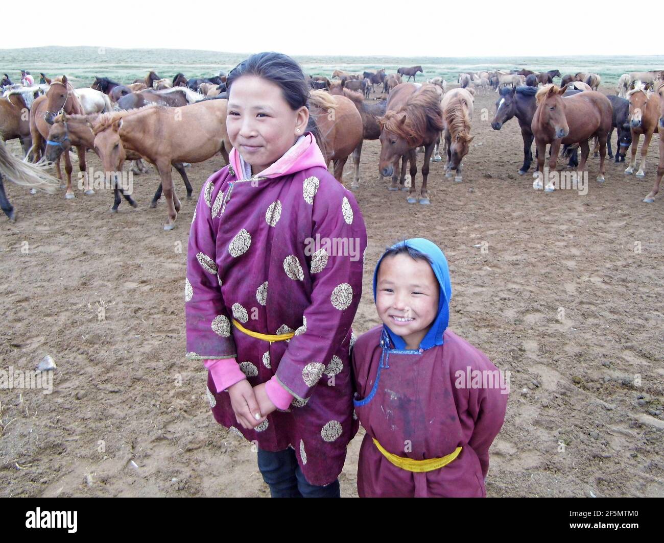 nomadic girl with her little brother, Mongolia Stock Photo