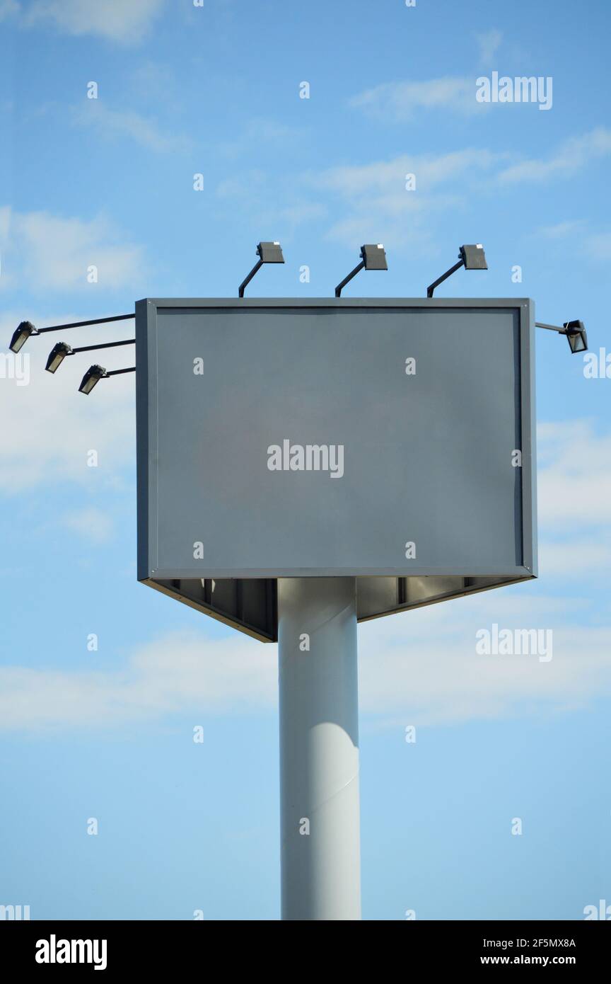 Big sign with blackboard for announcements, outdoor advertising billboard on blue sky Stock Photo