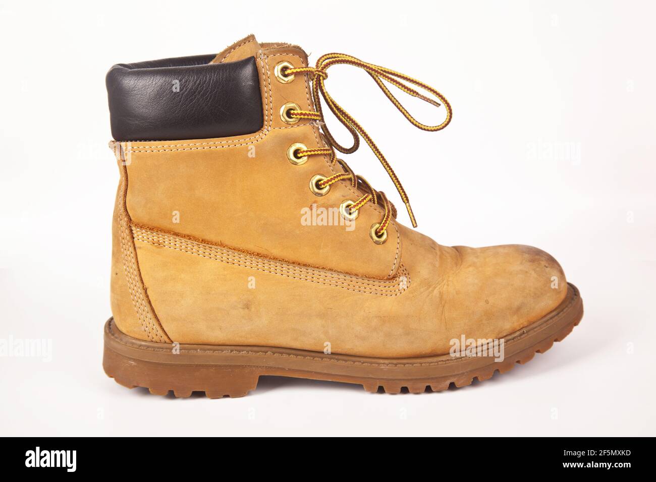 Hiking shoes and a white background, Sturdy hiking boots, strong hiking boots Stock Photo Alamy