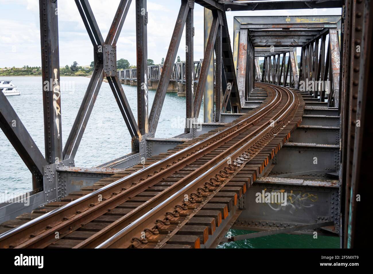 Matapihi railway bridge over Tauranga harbour, Bay of Plenty, North Island, New Zealand Stock Photo