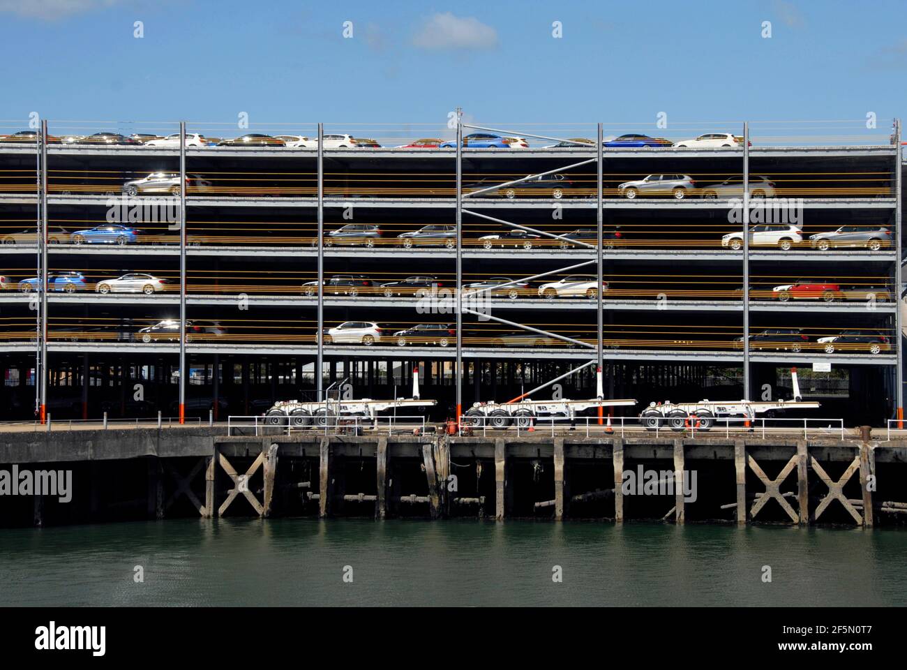 New cars awaiting export from the UK in a multi-storey car park, Southampton, Hampshire, England Stock Photo