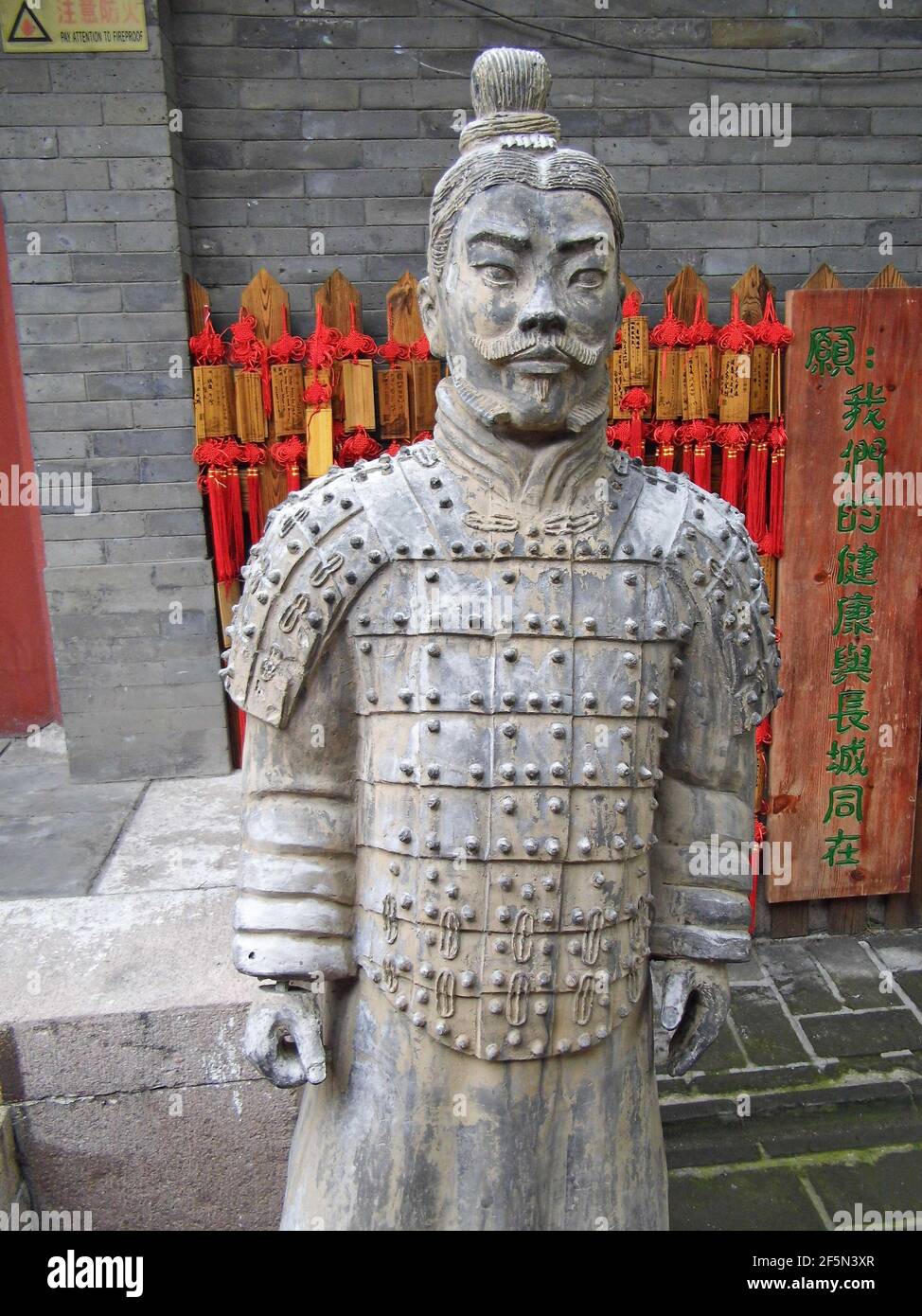reproduction of a Terracotta Warrior, Chinese Wall near Beijing, China Stock Photo