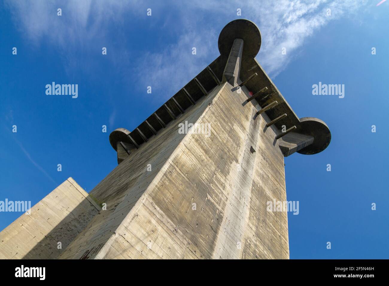 A look from below towards the upper part of former Nazi air defense tower (Flakturm) VII L in Augarten park in Vienna. Stock Photo