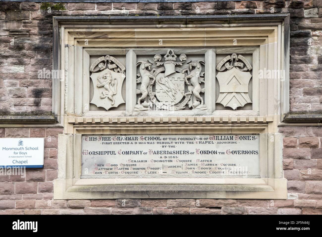 Plaque and shield commemorating the Free Grammar School, Monmouth School for Boys, Monmouth, Wales, UK Stock Photo