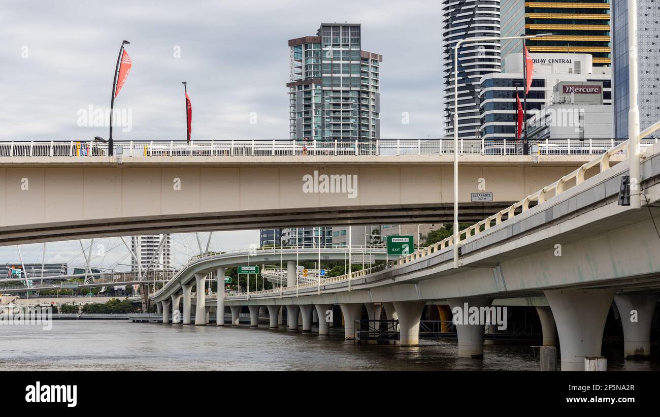 The iconic riverside expressway and Brisbane Cityscape along the Brisbane River in Queensland on March 24th 2021 Stock Photo