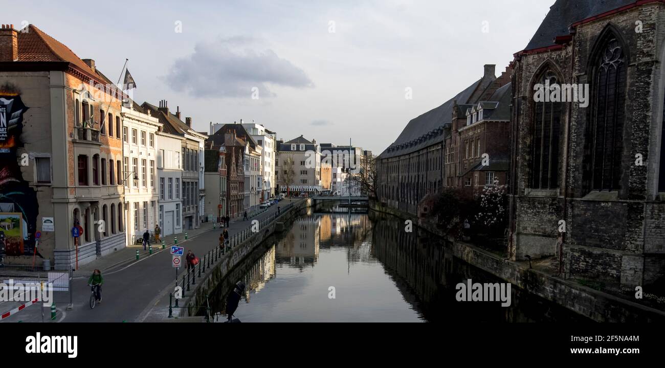 The River Leie from St Michael's Bridge, with St Micihelskerk on the right (Ghent, Belgium) Stock Photo