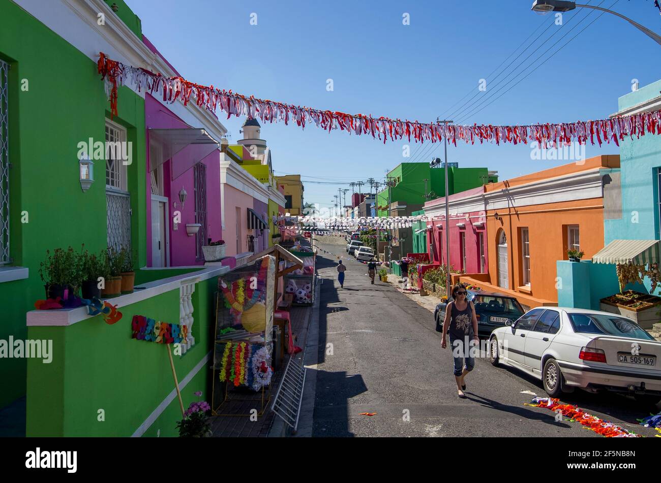 Brightly coloured houses on a sunny August (winter) day in the Bo Kaap neighbourhood of Cape Town, South Africa. Stock Photo