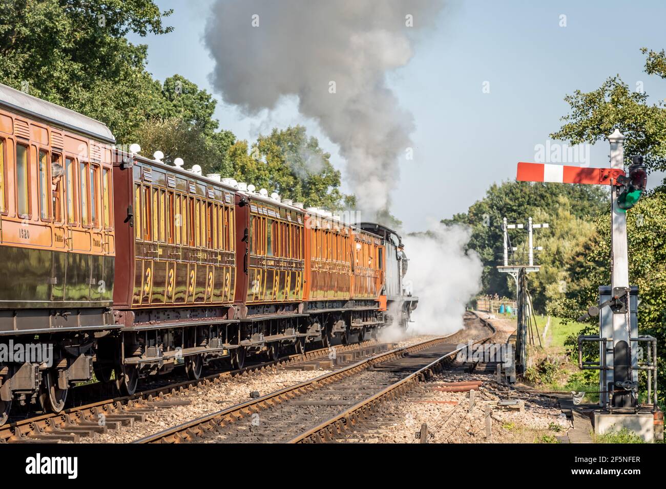 BR 'Q' 0-6-0 No. 30541 departs from Sheffield Park station on the Bluebell Railway, West Sussex Stock Photo