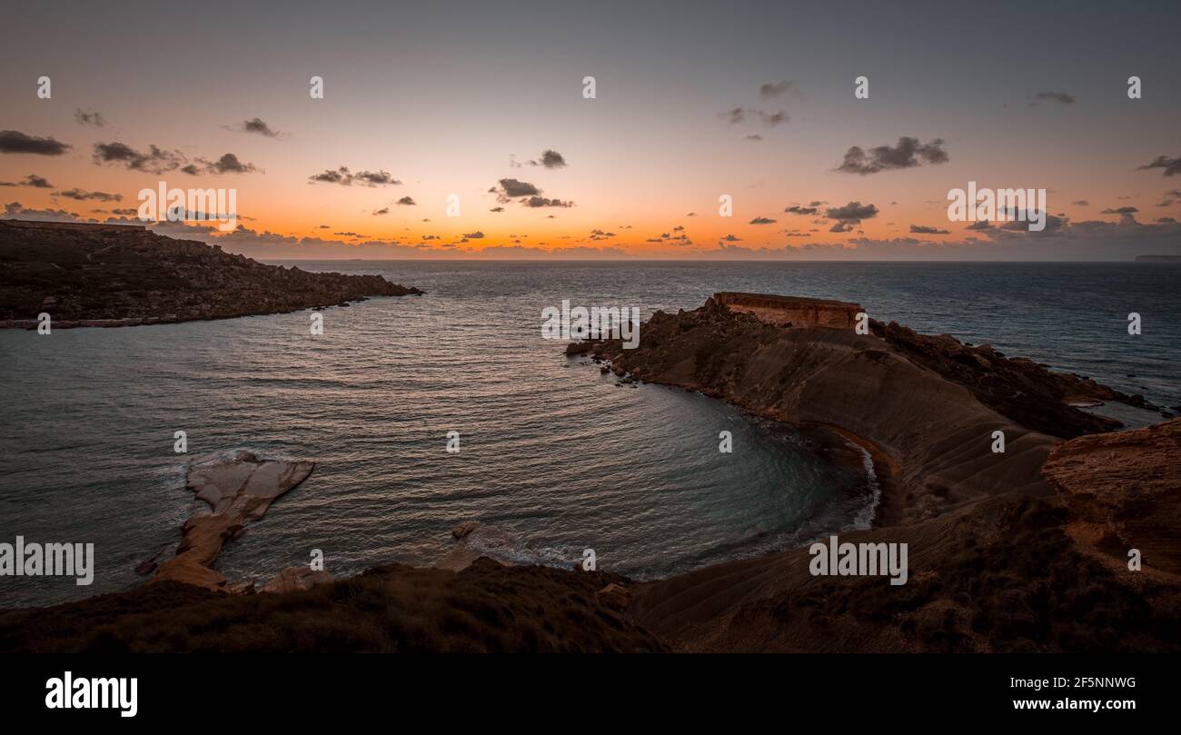 Sunset in Ghajn Tuffieha, Golden Bay, Gnejna Bay, Malta Stock Photo - Alamy