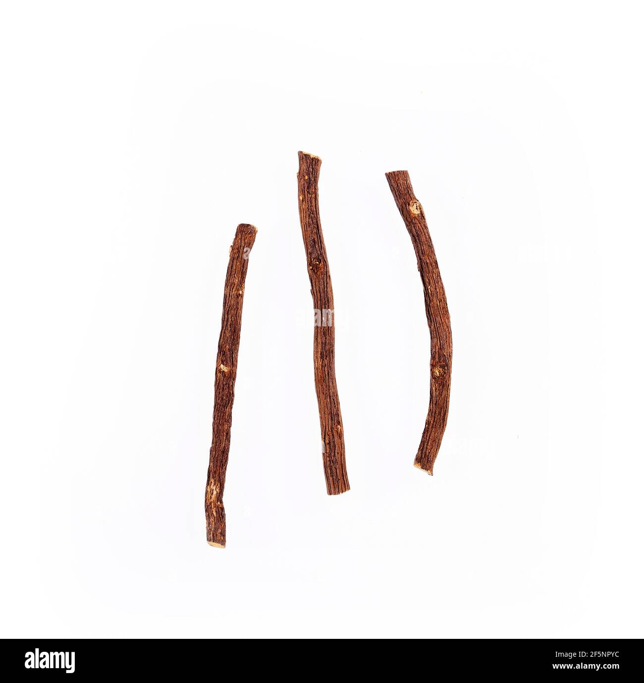 Chunks of Licorice Roots Glycyrrhiza glabra. White background Stock