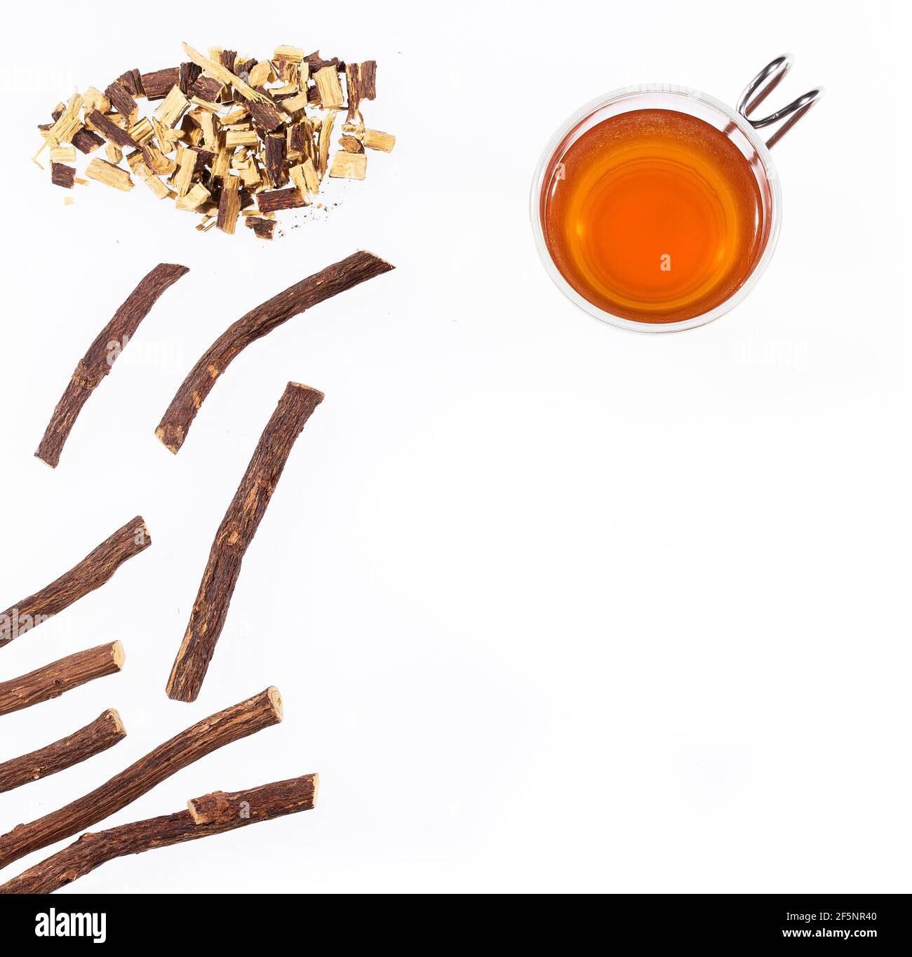 Licorice tea cup and root pieces Glycyrrhiza glabra Stock Photo Alamy