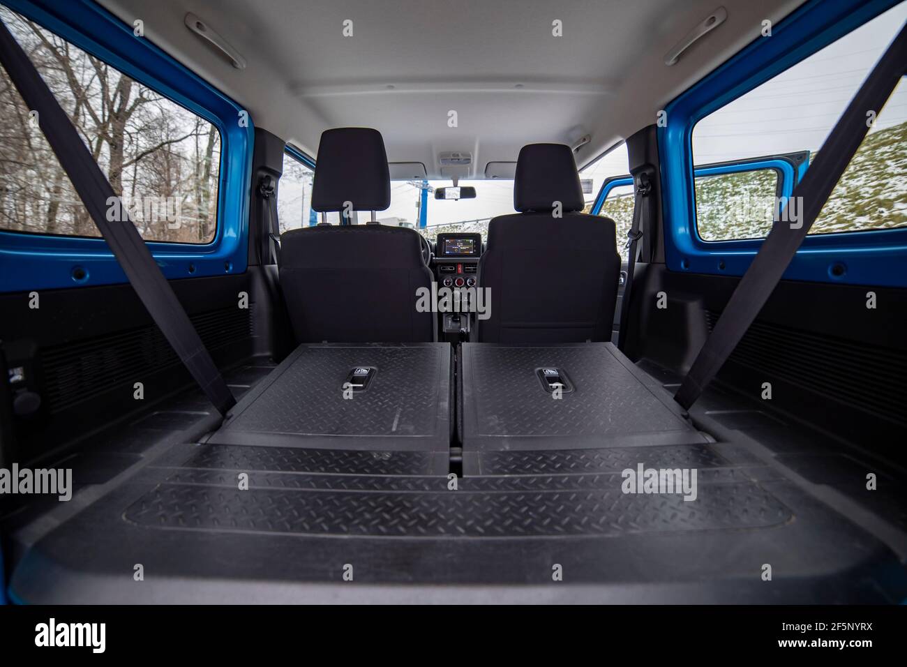 huge empty car trunk in interior of compact suv. rear seats in offroad suv car folded in flat flor Stock Photo