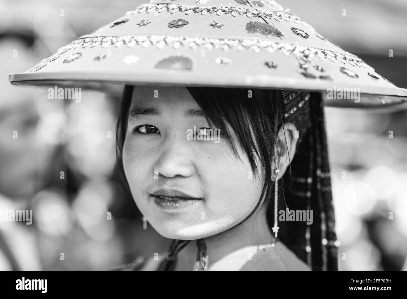 A Young Danu Ethnic Minority Woman In Traditional Costume At The Annual Pindaya Cave Festival, Pindaya, Shan State, Myanmar. Stock Photo