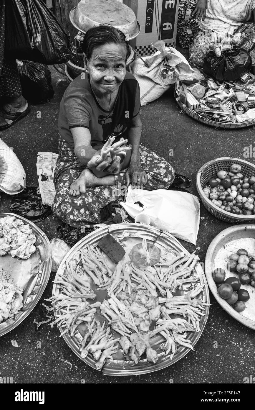 A Woman Sells Poultry Products In The 26th Street Market, Yangon, Myanmar. Stock Photo