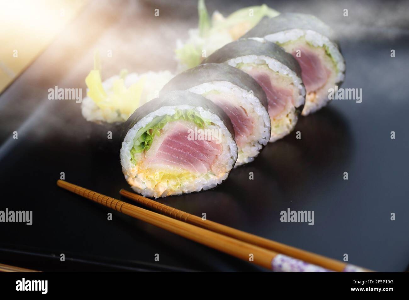 appetizing and tasty smoked sushi Stock Photo