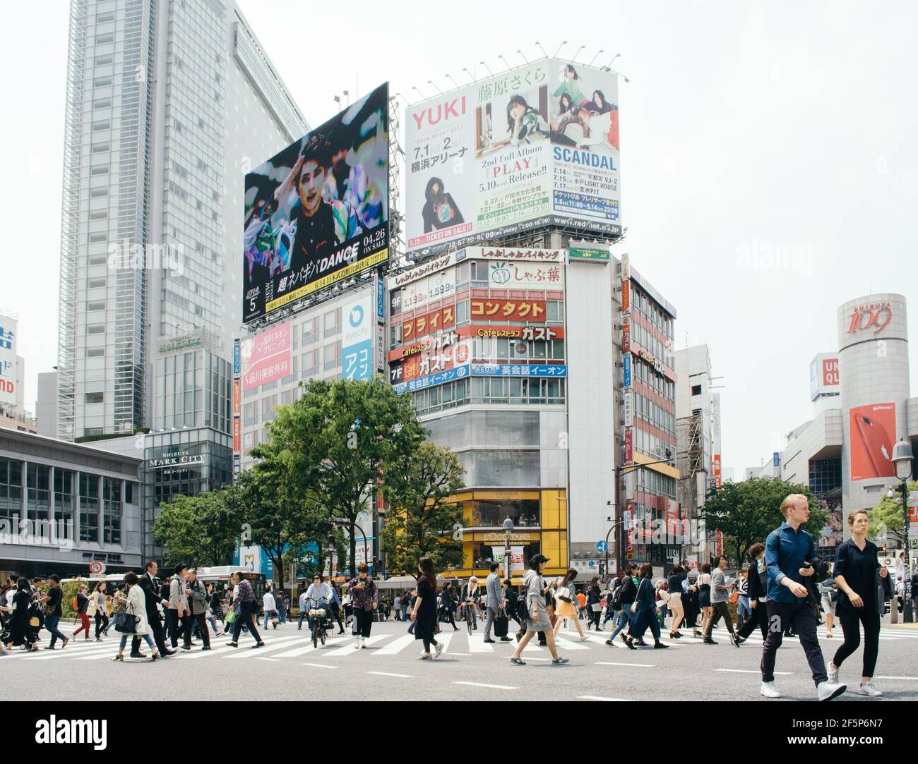 Shibuya, Tokyo, Japan - Shibuya scramble crossing. Many people crossing ...