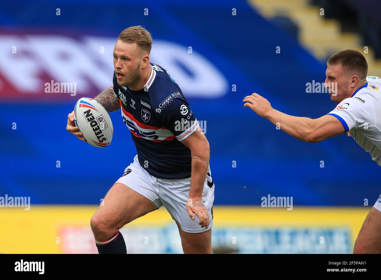 Joe Westerman (13) of Wakefield Trinity makes a break in, on 3/27/2021 ...