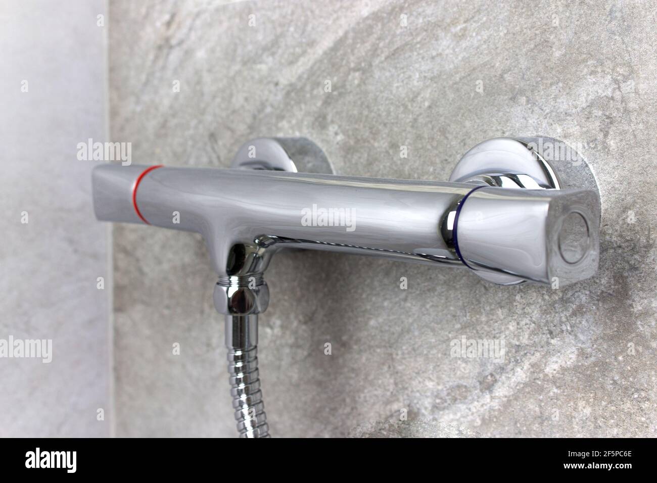 Bath Shower Mixer. Detail of shower mixer faucet, chromeplated metal faucet for the bathroom