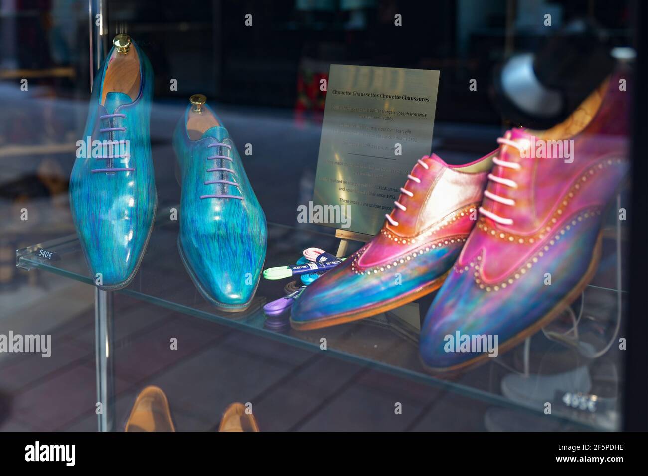 BEAUNE, FRANCE - AUGUST 03,2019: Fashionable luxury men's shoes on a shop window Stock Photo