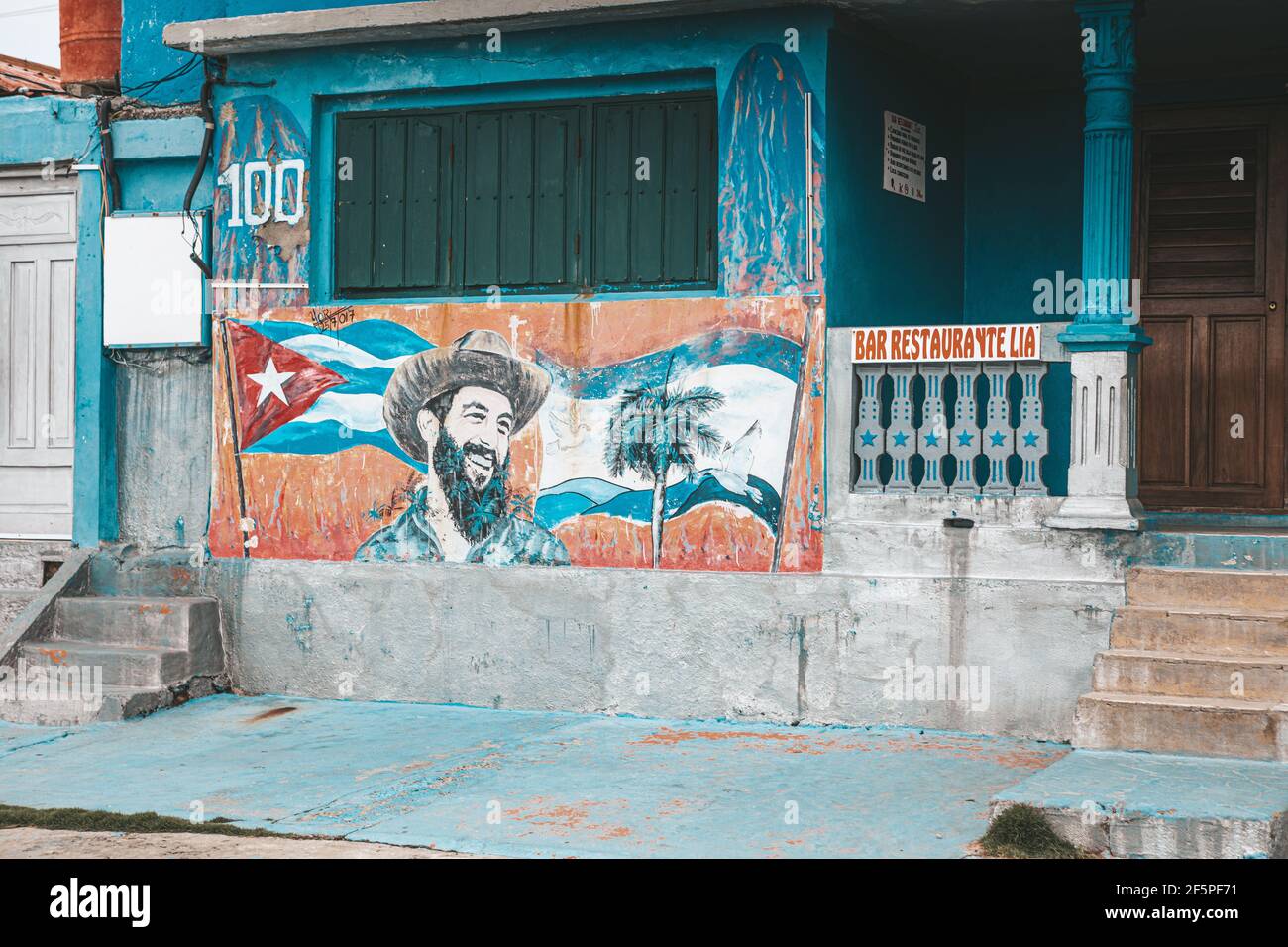 Baracoa, Cuba - October 25, 2019: Graffiti and wall painting representing the Cuban national hero Camilo Cienfuegos Stock Photo