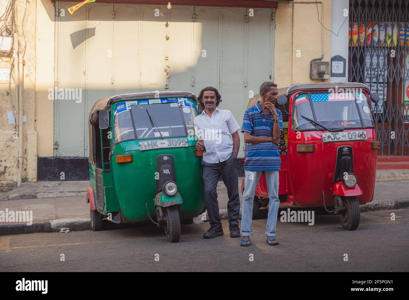 Kandy Sri Lanka March 19 A Pair Of Local Sri Lankan Auto Rickshaw Drivers Look For Customers On The Streets Of Kandy Sri Lanka Stock Photo Alamy