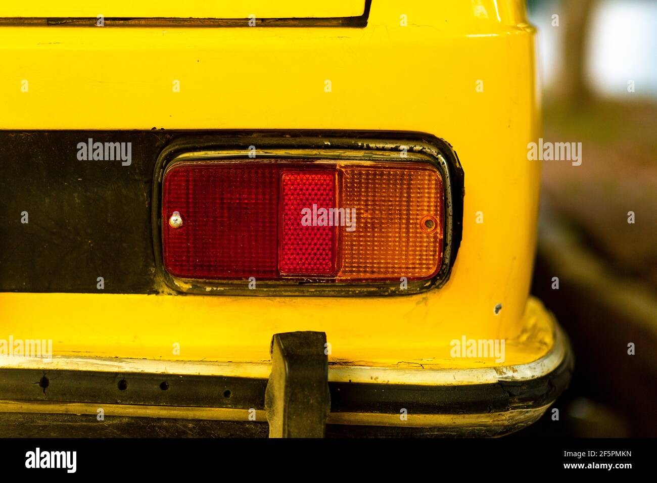 Taillight details of an antique car in yellow in Turkey Stock Photo - Alamy
