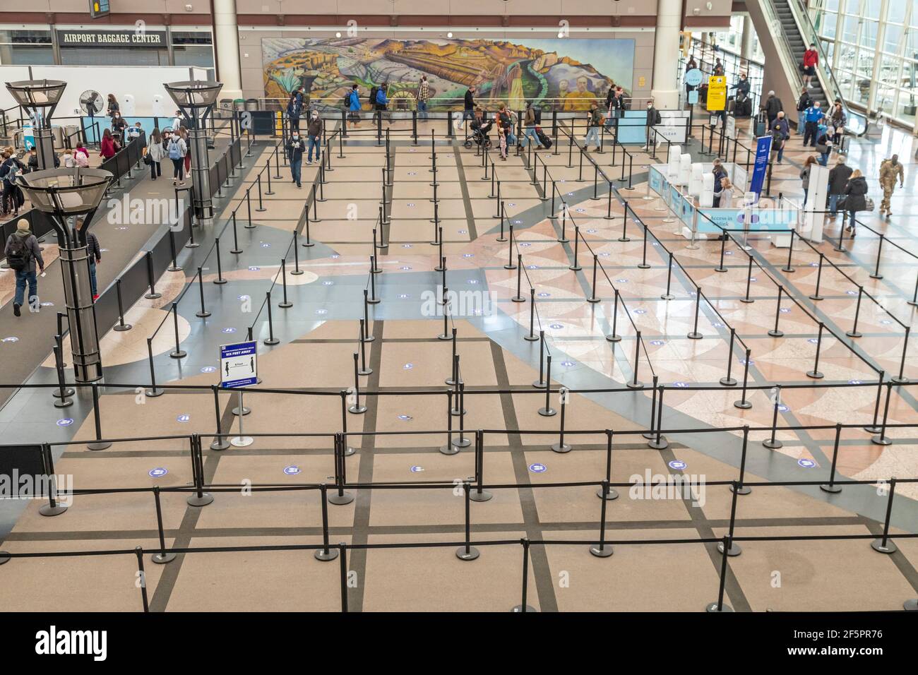 Denver, Colorado - An empty security screening area at Denver International Airport. Though travel has increased with Americans' hope that the coronav Stock Photo