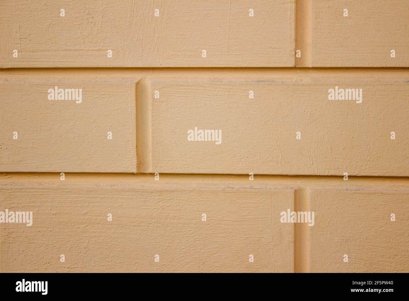 Light orange Brick wall concrete texture. Grunge, cement.  Stock Photo