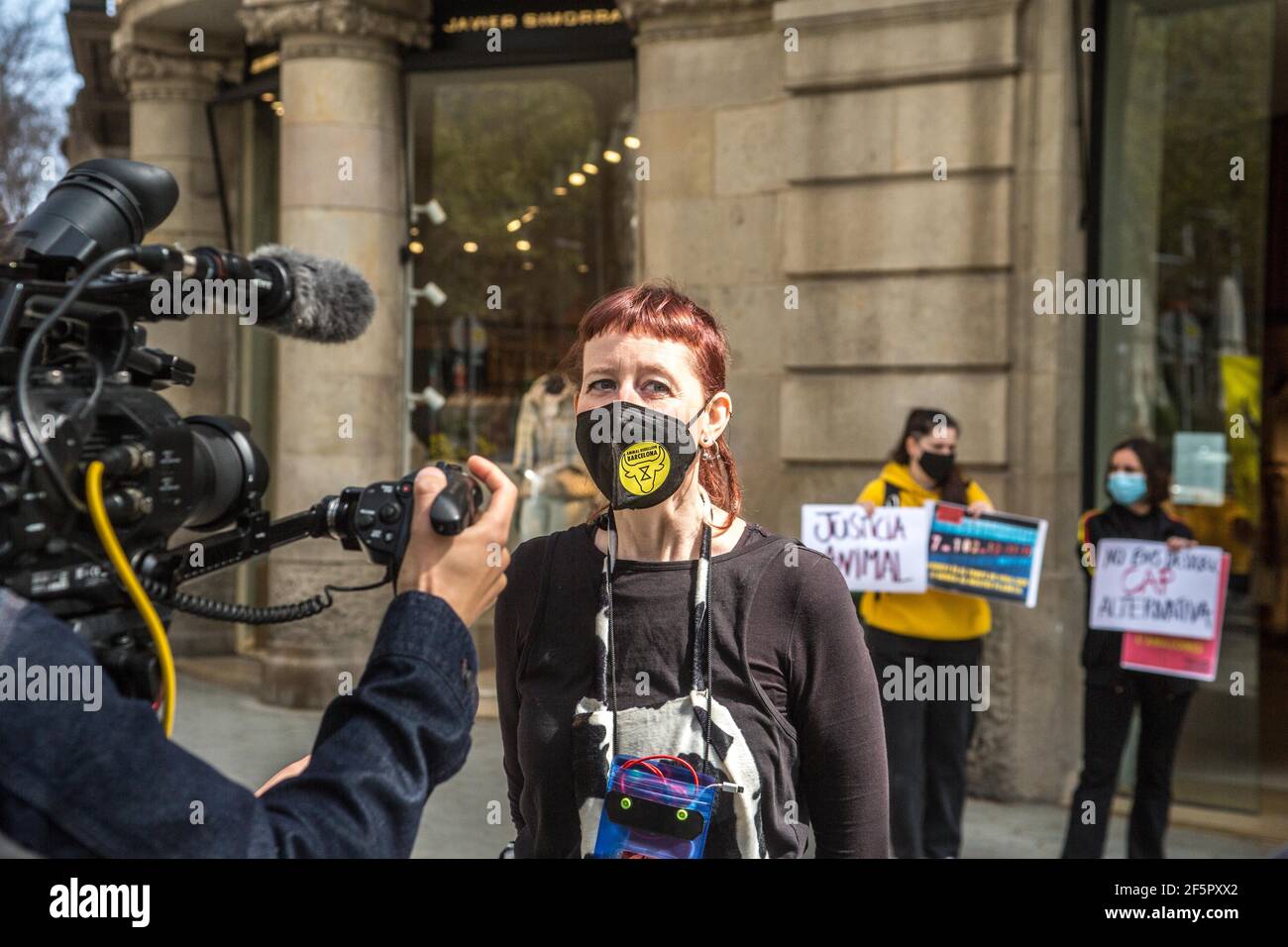 A protester is seen giving interview during the demonstration.The Barcelona representatives of Animal Rebellion, an international movement for the fight for a sustainable food system, climate justice and defense of animals has carried out protest in front of the Headquarters of the European Union Commission in Barcelona a direct action non-violent to ask the Directorate General for Agriculture and Rural Development of the European Commission to withdraw the current CAP (Common Agricultural Policy). Stock Photo