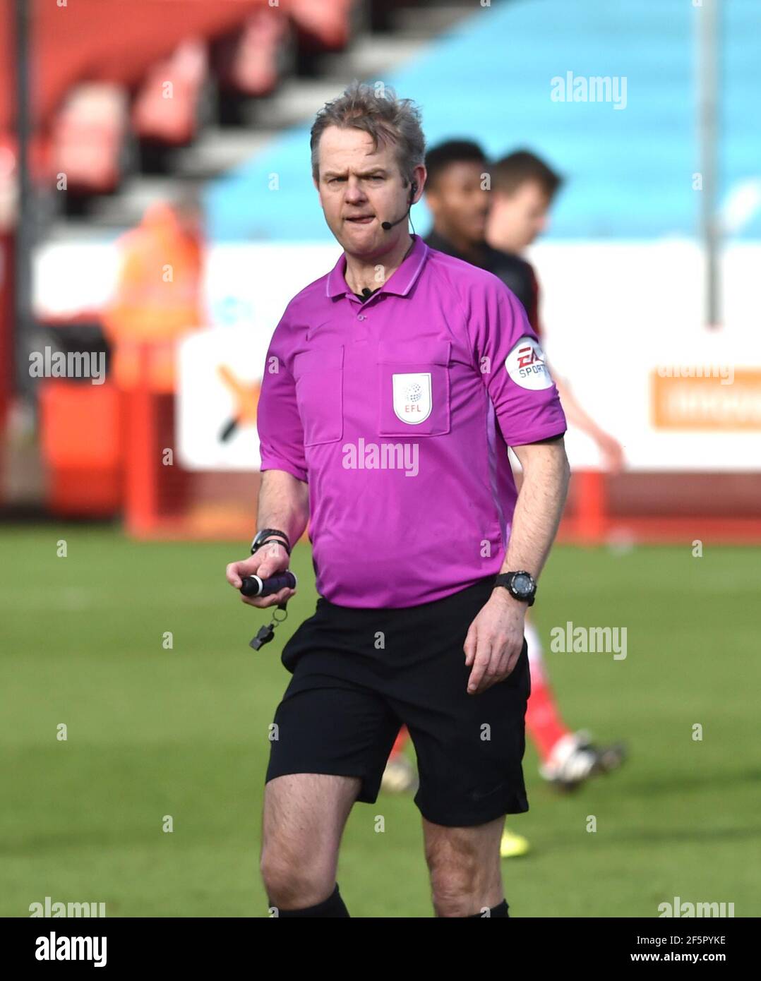 Referee Christopher Sarginson during the Sky Bet League Two match between Crawley Town and Port Vale at the People's Pension Stadium   , Crawley ,  UK - 27th March 2021 - Editorial use only. No merchandising. For Football images FA and Premier League restrictions apply inc. no internet/mobile usage without FAPL license - for details contact Football Dataco Stock Photo