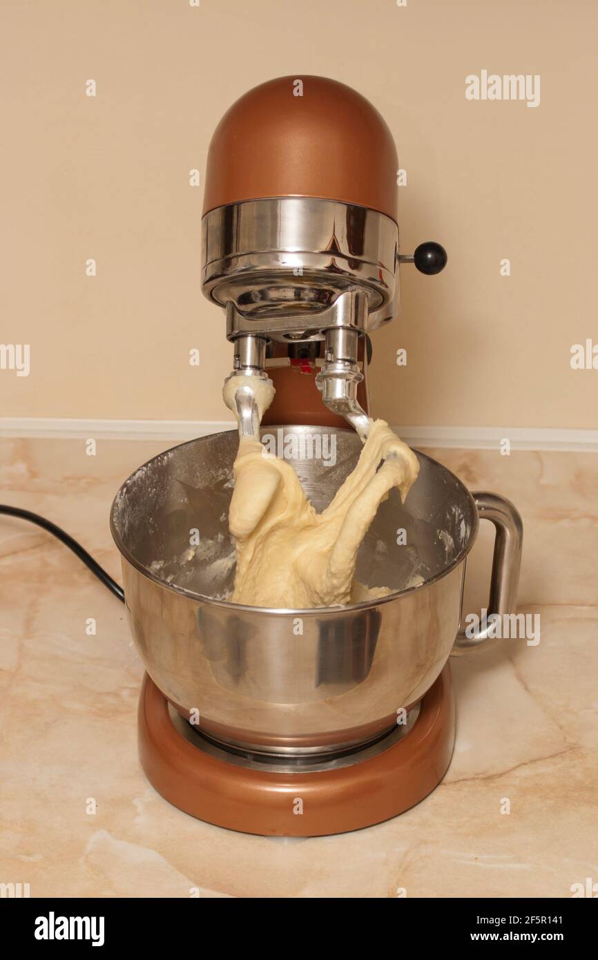 https://c8.alamy.com/comp/2F5R141/kneading-the-dough-in-an-electric-mixer-making-dough-at-home-for-baking-in-a-mixer-2F5R141.jpg