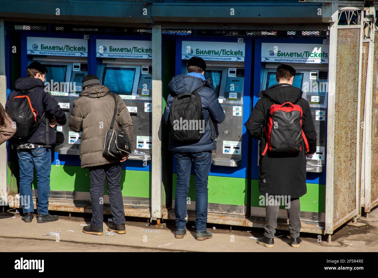 Moscow, Russia. 27th March, 2021. Passengers buy tickets for commuter trains at ticket machines at the Yaroslavsky Railway Station in Moscow, Russia Stock Photo